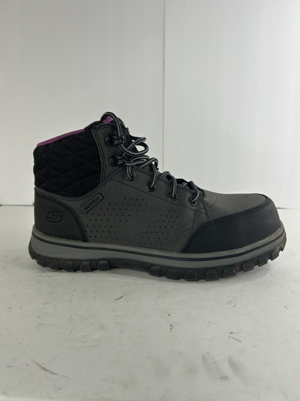 Skechers Women's Black Lace-Up Quilted Ankle Boot with Purple Trim